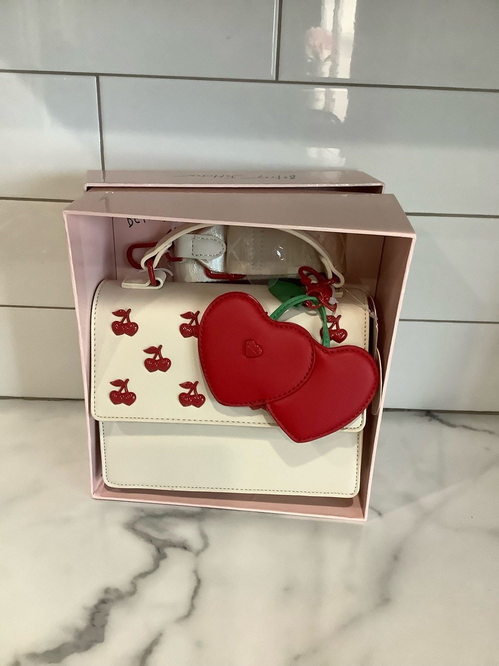 Betsey Johnson Cream Satchel with Red Cherry Print and Red Heart Charm